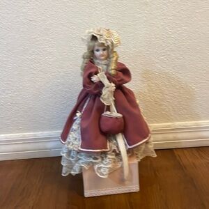 1887 Limited edition Porcelain doll with music box.